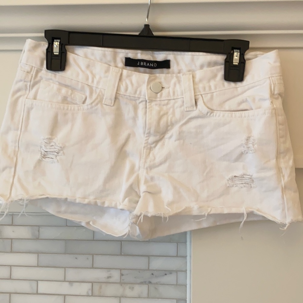 J brand cut off white denim shorts 25